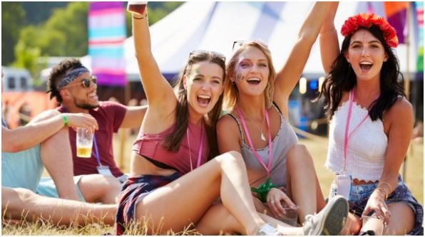 What strategies help solo attendees enjoy music-heavy festivals?